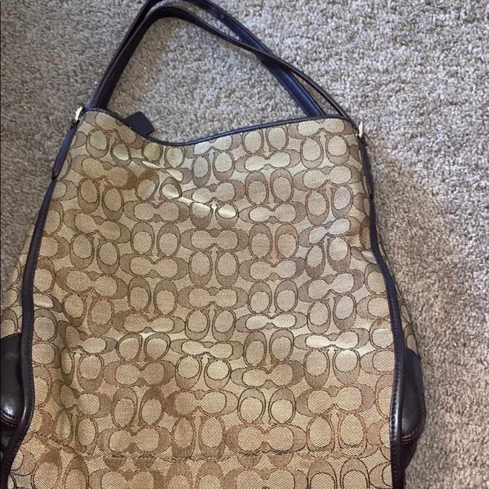 Coach bag with three compartments inside